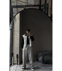 Oversized varsity jacket set.